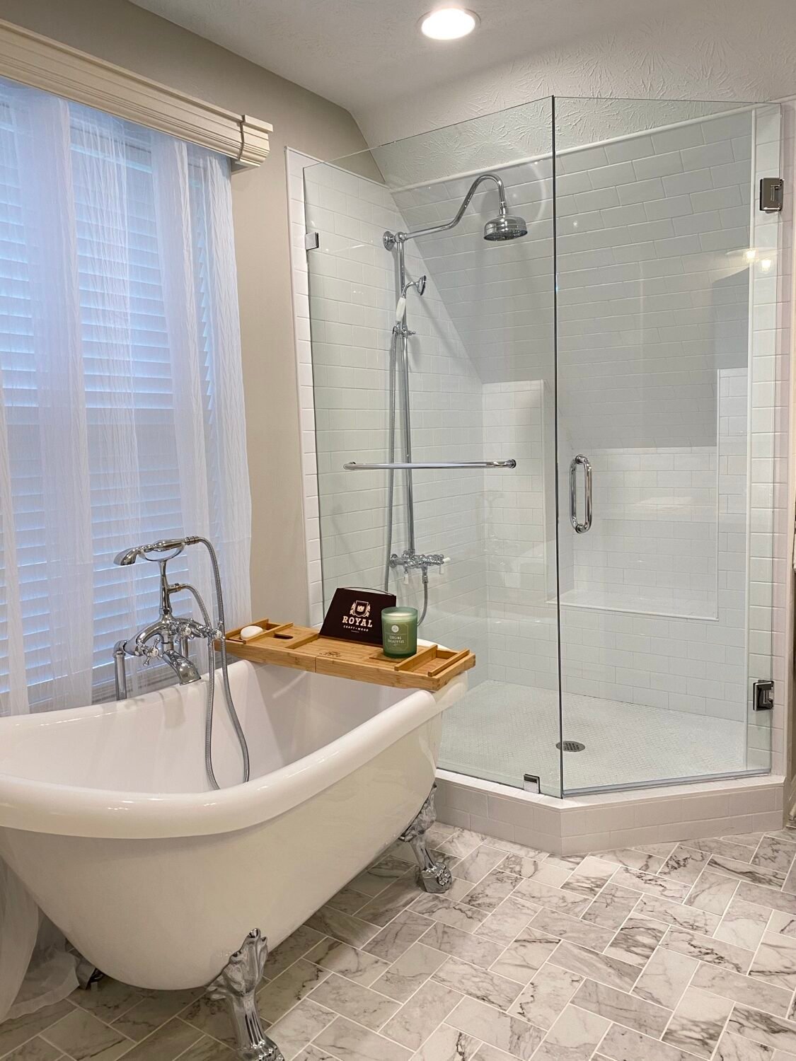 Primary suite bathroom in a second master suite addition in Dawsonville, GA with a freestanding tub and corner shower, Holley Project by GHIR Construction